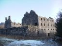Two four storey high blocks and front wall of the Bernera Barracks